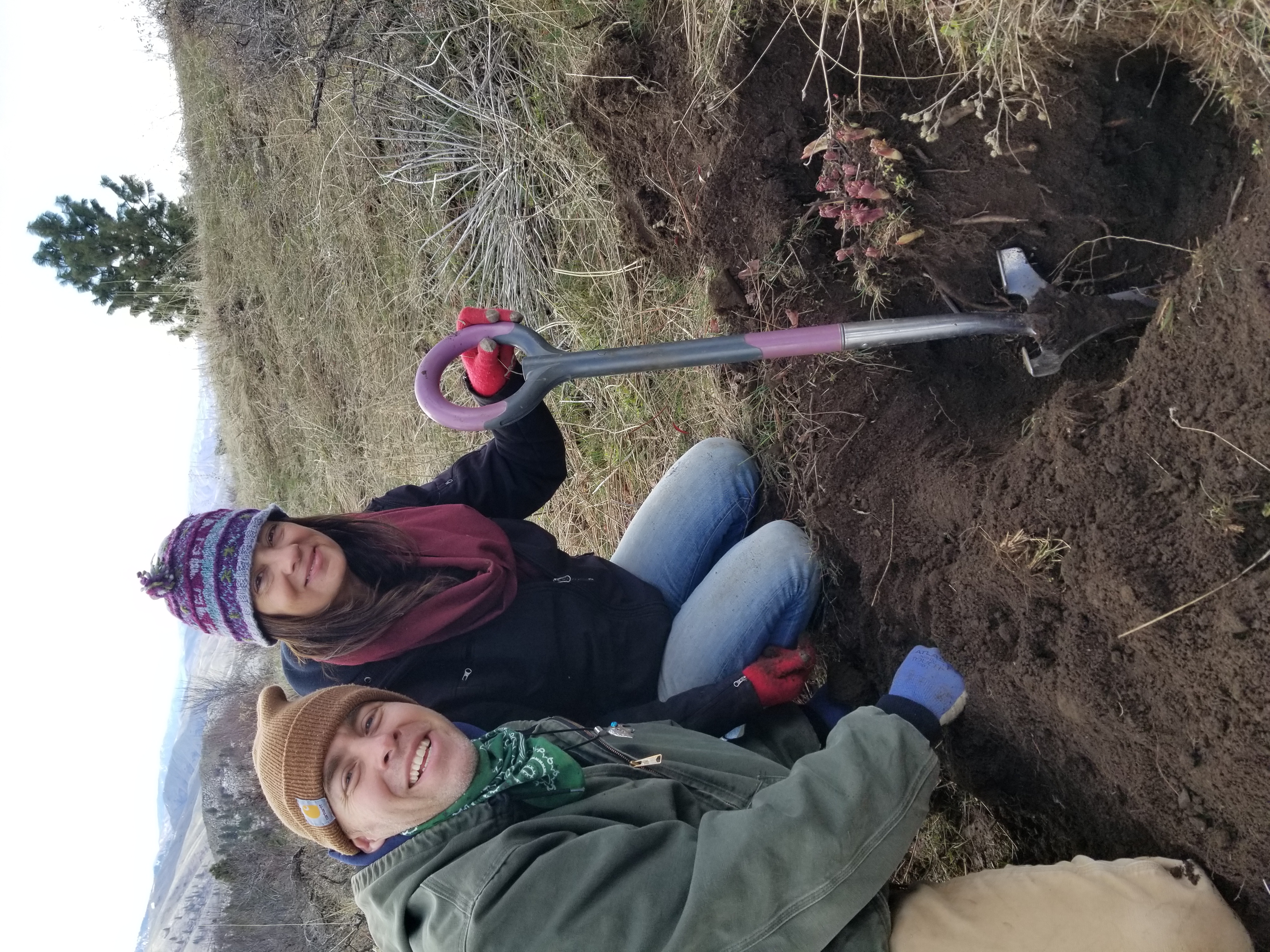 Image of Jules and Will Digging a Brown’s Peony Root